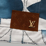 Back view of Louis Vuitton luxury clothing with signature branding