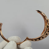 Close-up detail view of Cartier unisex jewelry piece