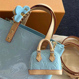  understated carryall bag styled with outfit