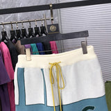Close-up detail shot of Rhude luxury clothing with relaxed-fit cut