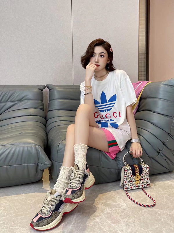 Back view of Gucci luxury clothing with signature branding