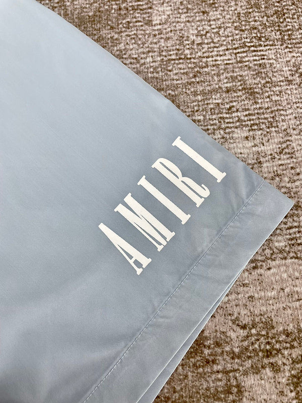 Three-quarter angle view of Amiri luxury piece style No.079
