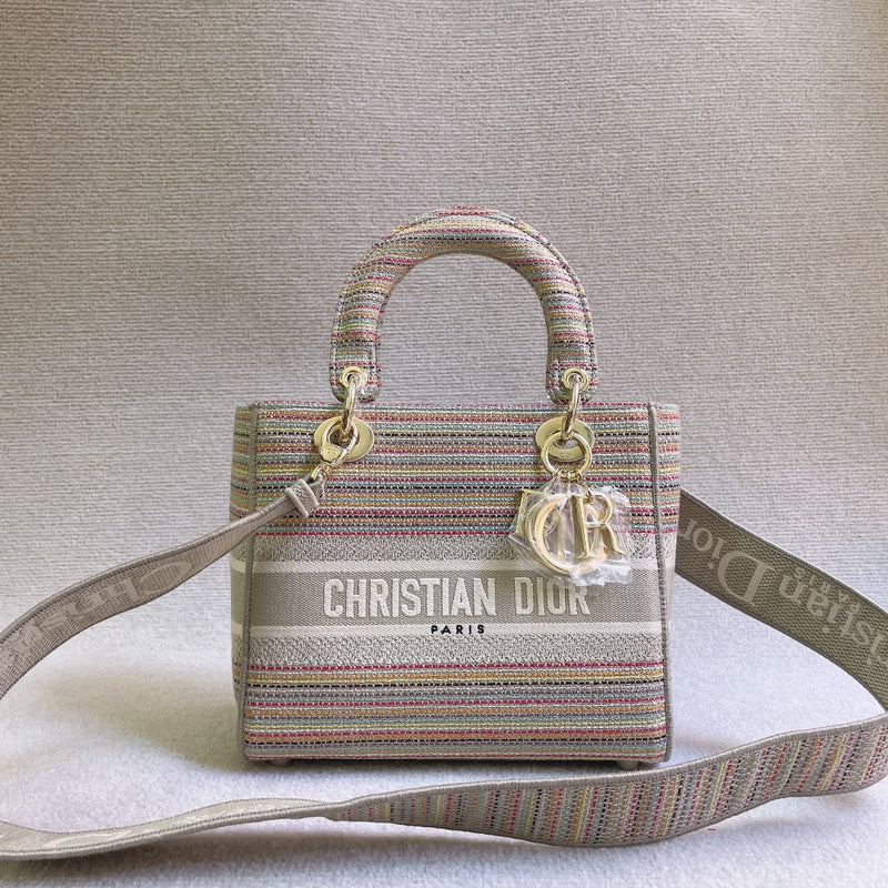 Styled lifestyle shot of polished classic women's handbag – women's luxury accessory