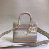 Styled lifestyle shot of polished classic women's handbag – women's luxury accessory