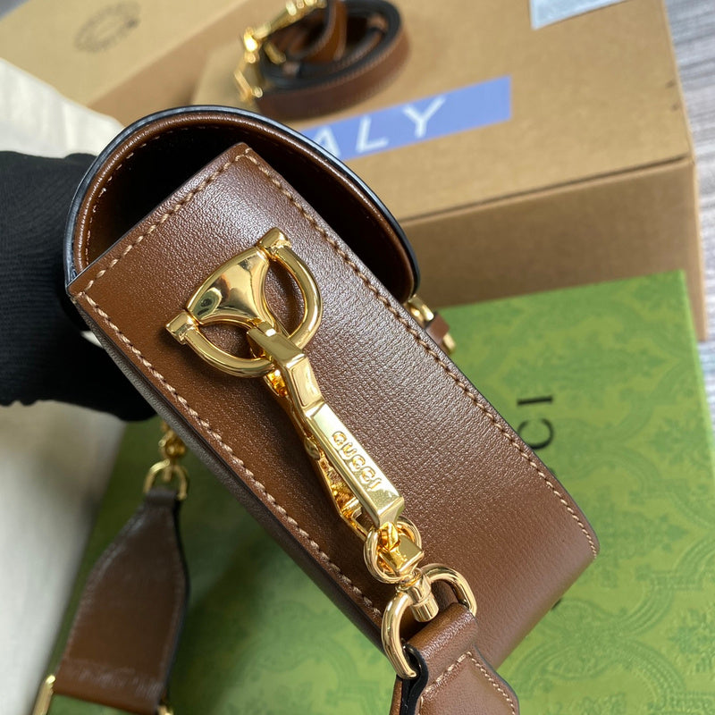Handle and strap detail of premium classic women's handbag – women's statement bag
