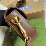 Handle and strap detail of premium classic women's handbag – women's statement bag