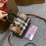 Ziva's Charm handbag – side angle view (one versatile size)