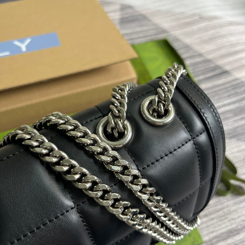 Side profile of statement refined women's handbag – women's statement bag
