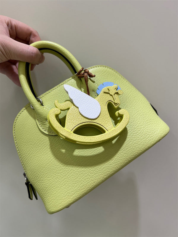 Side view of clean-lined structured handbag