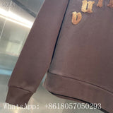 Side profile of Louis Vuitton luxury clothing with runway-inspired design