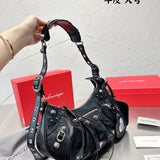 Ziva's Charm handbag – side angle view (one versatile size)