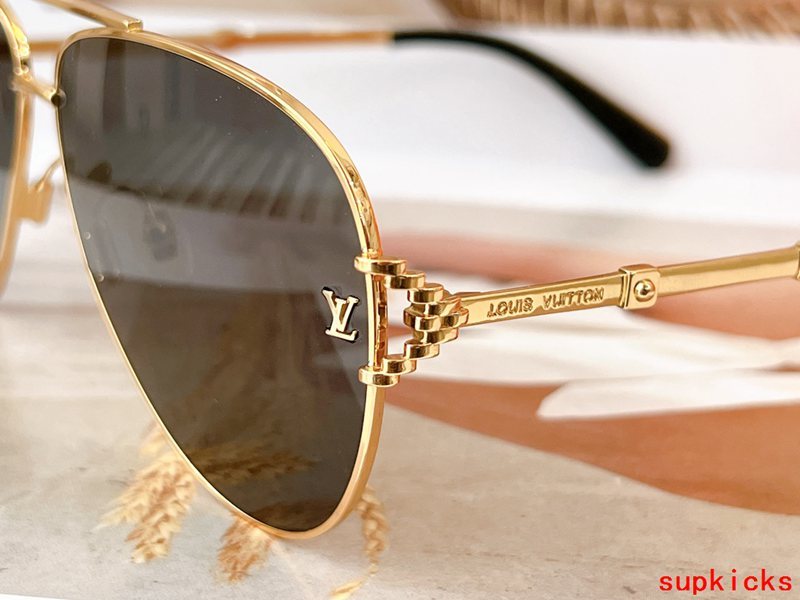 Close-up detail view of Louis Vuitton unisex sunglasses