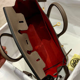 Side view of versatile structured handbag