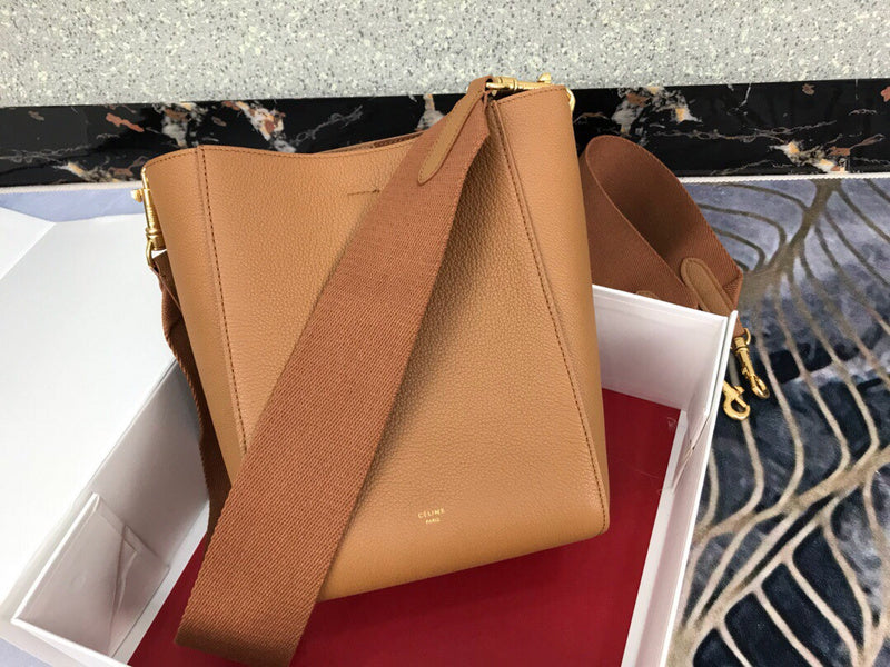 Side profile of structured statement women's handbag – women's designer-style accessory