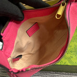 Side profile of chic signature women's handbag – women's designer-style accessory