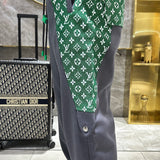 Back view of Louis Vuitton luxury clothing with everyday silhouette