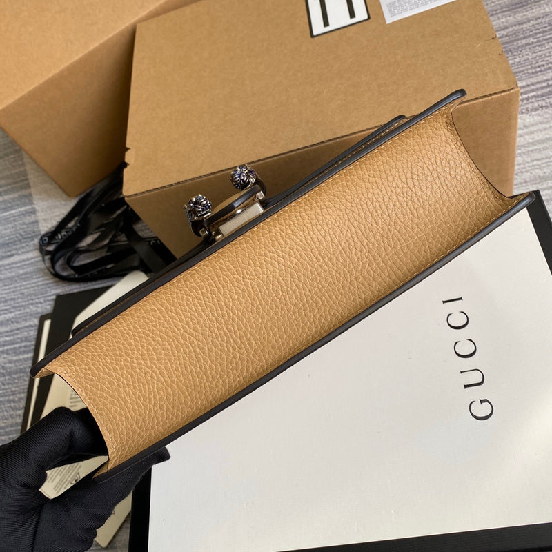 Handle and strap detail of structured sleek women's handbag – women's designer-style accessory