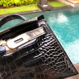 Understated shoulder bag carried on shoulder
