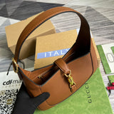 Styled lifestyle shot of classic modern women's handbag – women's luxury accessory