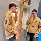 Close-up detail shot of Louis Vuitton luxury clothing with signature branding