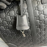 Side profile of elevated sleek women's handbag – women's luxury accessory