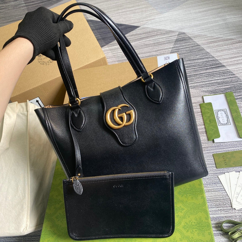 Handle and strap detail of classic elevated women's handbag – women's luxury handbag