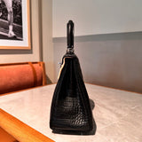 Side view of versatile structured handbag