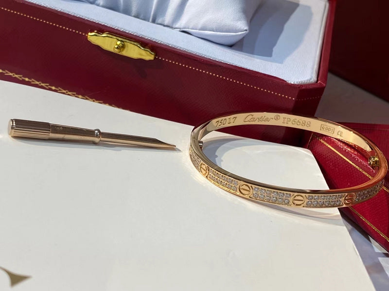 Angled view of Cartier unisex jewelry piece
