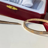 Angled view of Cartier unisex jewelry piece