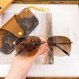 Angled view of Louis Vuitton unisex sunglasses