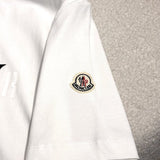 Full styled look of Moncler luxury clothing with monogram-inspired silhouette