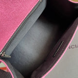 Top view of statement chic women's handbag – women's designer-style accessory
