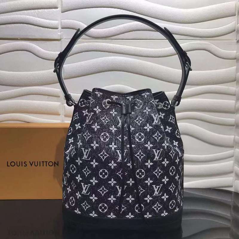 Side profile of structured statement women's handbag – women's everyday handbag
