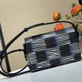  Effortless top-handle bag carried on shoulder