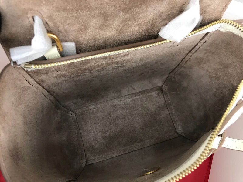 Side profile of statement structured women's handbag – women's luxury accessory
