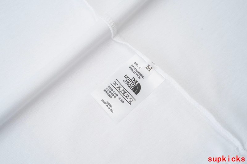 Close-up detail shot of Rhude luxury clothing with logo-detail design