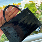 Side view of curated structured handbag