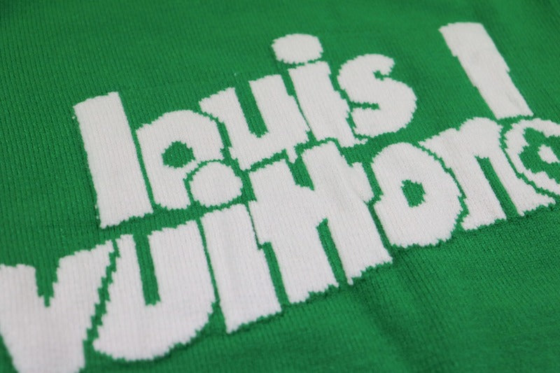 Full styled look of Louis Vuitton luxury clothing with logo-detail design