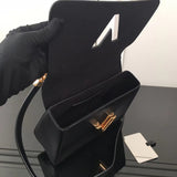 Handle and strap detail of elevated refined women's handbag – women's luxury handbag