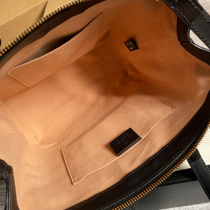 Close-up detail of premium signature women's handbag – women's designer-style accessory