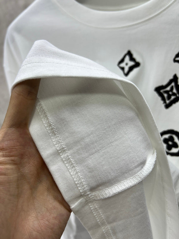 Side profile of Louis Vuitton luxury clothing with monogram-inspired silhouette