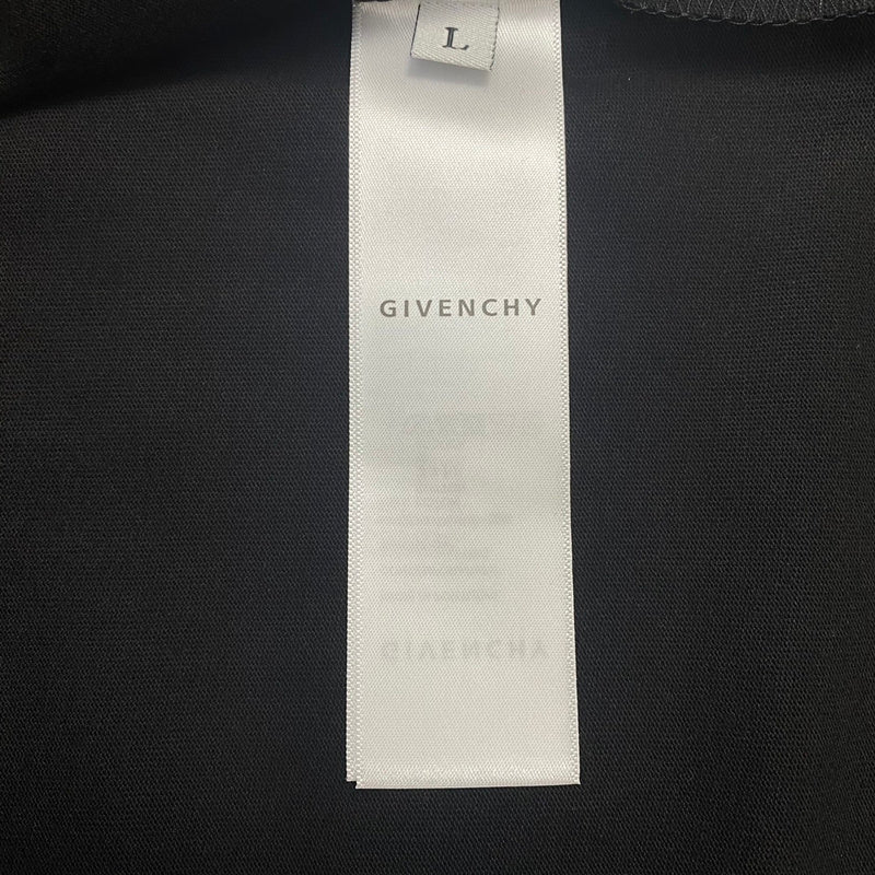 Front view of Givenchy luxury clothing with monogram-inspired silhouette
