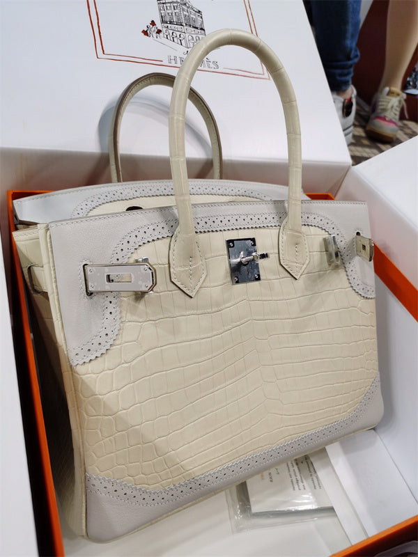  Curated structured bag carried on shoulder