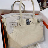  Curated structured bag carried on shoulder