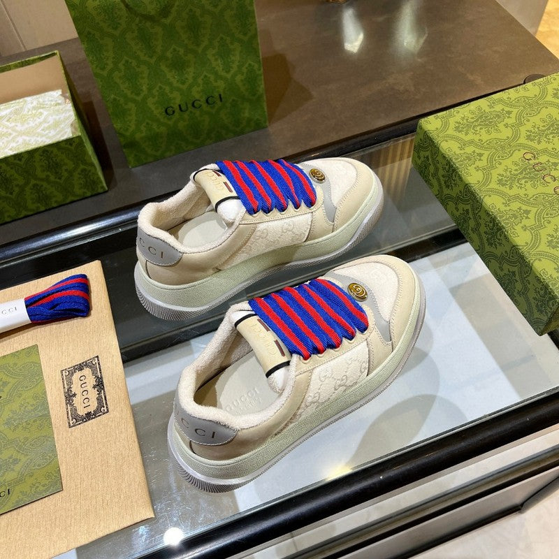 Side profile of Gucci clean off-white sneakers bold athletic profile