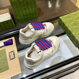 Side profile of Gucci clean off-white sneakers bold athletic profile
