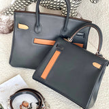 Side view of contemporary structured handbag