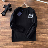 Full styled look of Louis Vuitton luxury clothing with logo-detail design