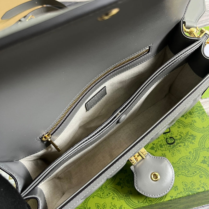 Close-up detail of premium polished women's handbag – women's designer-style accessory
