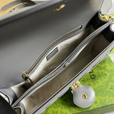 Close-up detail of premium polished women's handbag – women's designer-style accessory